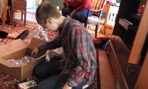 Child Cries Tears of Joy over Gaming Console for Christmas