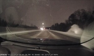 Driver Hits Ice Patch and Rolls Into Ditch