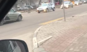 Taxi Takes Off with Passenger on the Hood