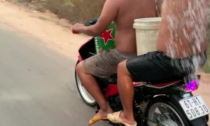 Dudes Shower While Driving a Scooter
