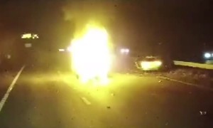 Truck Driver Rescues Woman From Burning Car