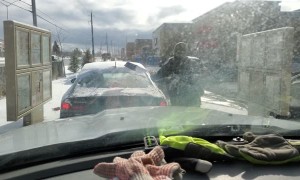 Canadian Clears Off Snow Covered Car