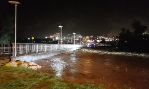 River Rises Rapidly Over Bridge After Heavy Rain