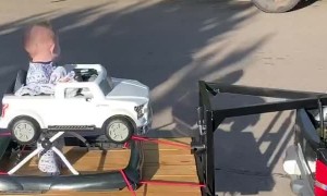 Tiny Car Towing Brother on Custom Trailer