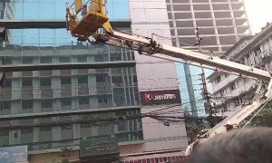 Cat Rescued from Skyscraper Ledge