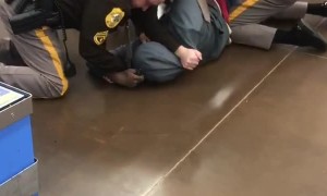 Police Officer Unloads Taser After Tussle