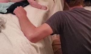 Dad Catches Baby Sliding Off Bed