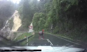 Raging Waterfalls Flood the Road