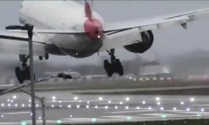 Airplane trying to land in Storm Ciara performs a touch & go