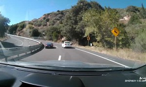 Car Overcorrects on Sweeping Highway Corner