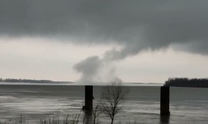 Strange looking tornado forms over the Mississippi River