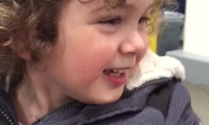 Happy Young Boy Saying Hello to Fellow Shoppers