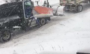 Snow Plow Shunts Truck up Slippery Hill