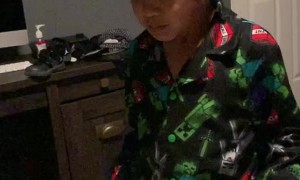 Distracting His Son While Pulling Tooth