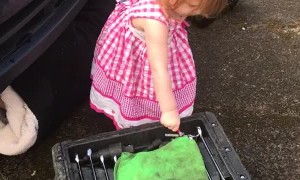 Daughter Helps Daddy with Car Maintenance