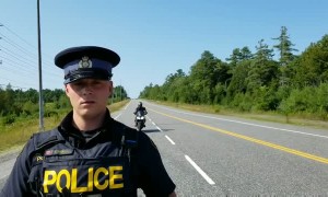 Officer hides motorcycle behind pen