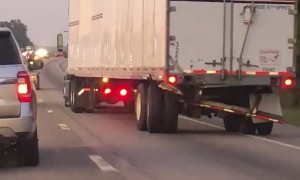 Truck with Broken Trailer Driving on Interstate