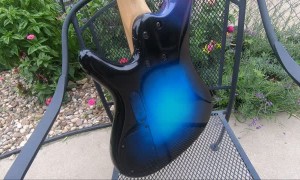 Spray Painting a Custom Space Design On Guitar