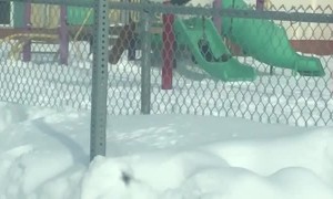 Abominable Snowman Seen on Playground Swing