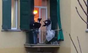 Balcony entertainment in Bologna taking ease off quarantine 