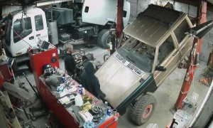 Jeep Falls off Lift in Shop