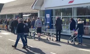 People Line the Block to Enter UK Store