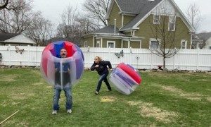 Couple Engage in Bouncy Duel during Quarantine