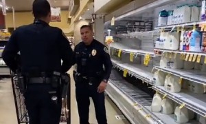 San Diego police officers help elderly man do his shopping