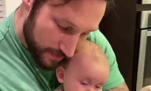 Watch this dad use his beard to put the baby to sleep