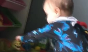 Kiddo Uses Forehead for Hammer Practice