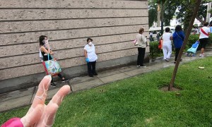 Line for Grocery Store Wraps Around the Block in Peru