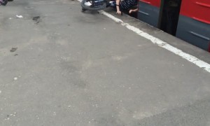 Unsuccessful Bike Trick on a Train