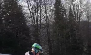 Buddies Show Off a Funky Snowboarding Trick