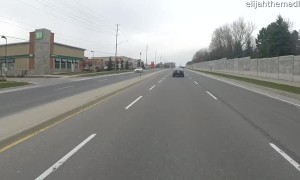 Motorcycle Rider Cleans up the Road While Riding