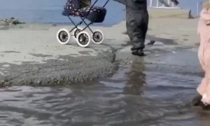 Toddler Takes a Tumble into Puddle
