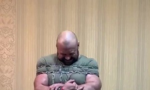 Strongman Snaps Iron Chains