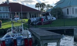 Crash Leaves Boat Beached in Backyard