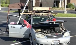 Parking Lot Musician Performs on Top of Car