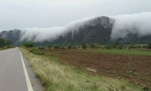 Clouds Climbing Over Mountains
