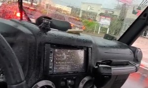 Driving in the Rain Is Not Fun With No Doors or Roof