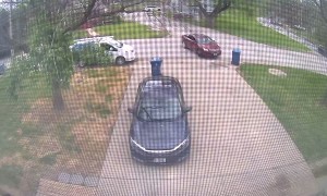Sedan Gives Trashcan a Tap