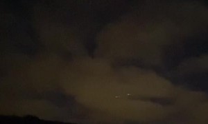 Space Junk Streaks Across the Night Sky