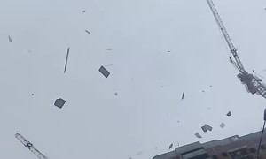 Building Materials Fly Off a Building During a Storm