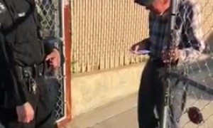 LAPD police officer stopped by to surprise an elderly man with $100 gift card