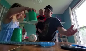 Four-Year-Old Baffled by Magic Ball Trick