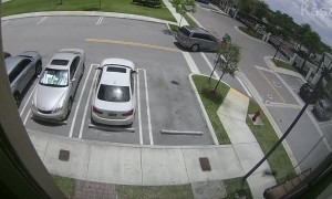 Car Speeds up and Slams Through Gate