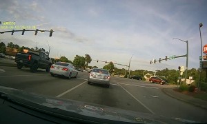 Red Light Runner Has Close Call With Traffic