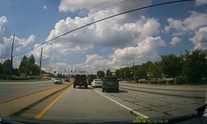 Driver's Unexpected Lane Change Causes Rollover