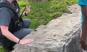 Emotional Police Officer Comforts Scared Girl