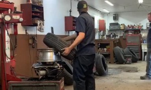 Mechanic Teaches Buddy How to Put the Tire on Quick